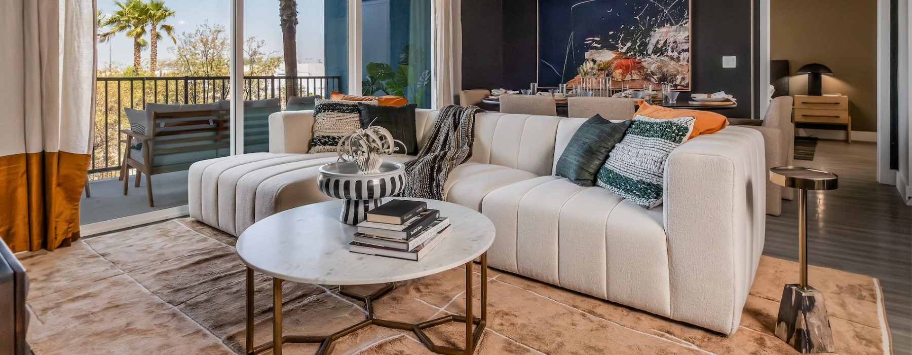 living area that includes ample seating spaces and bright lighting
