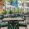 a group of tables and chairs outside
