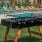 outdoor foosball table near the pool and amenities area