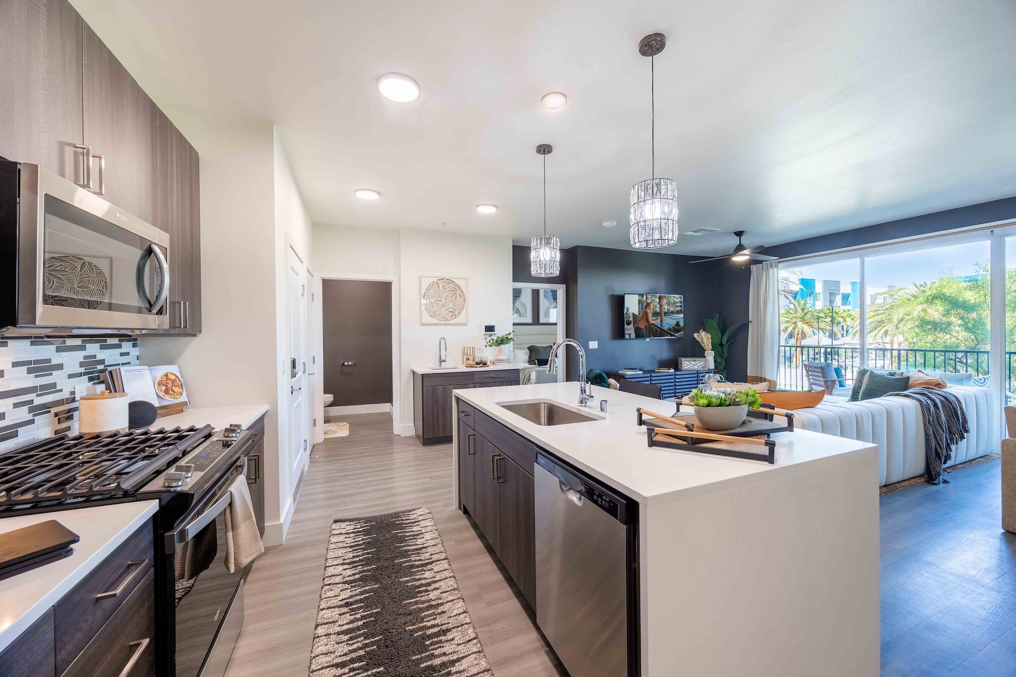 open kitchen with island and living room